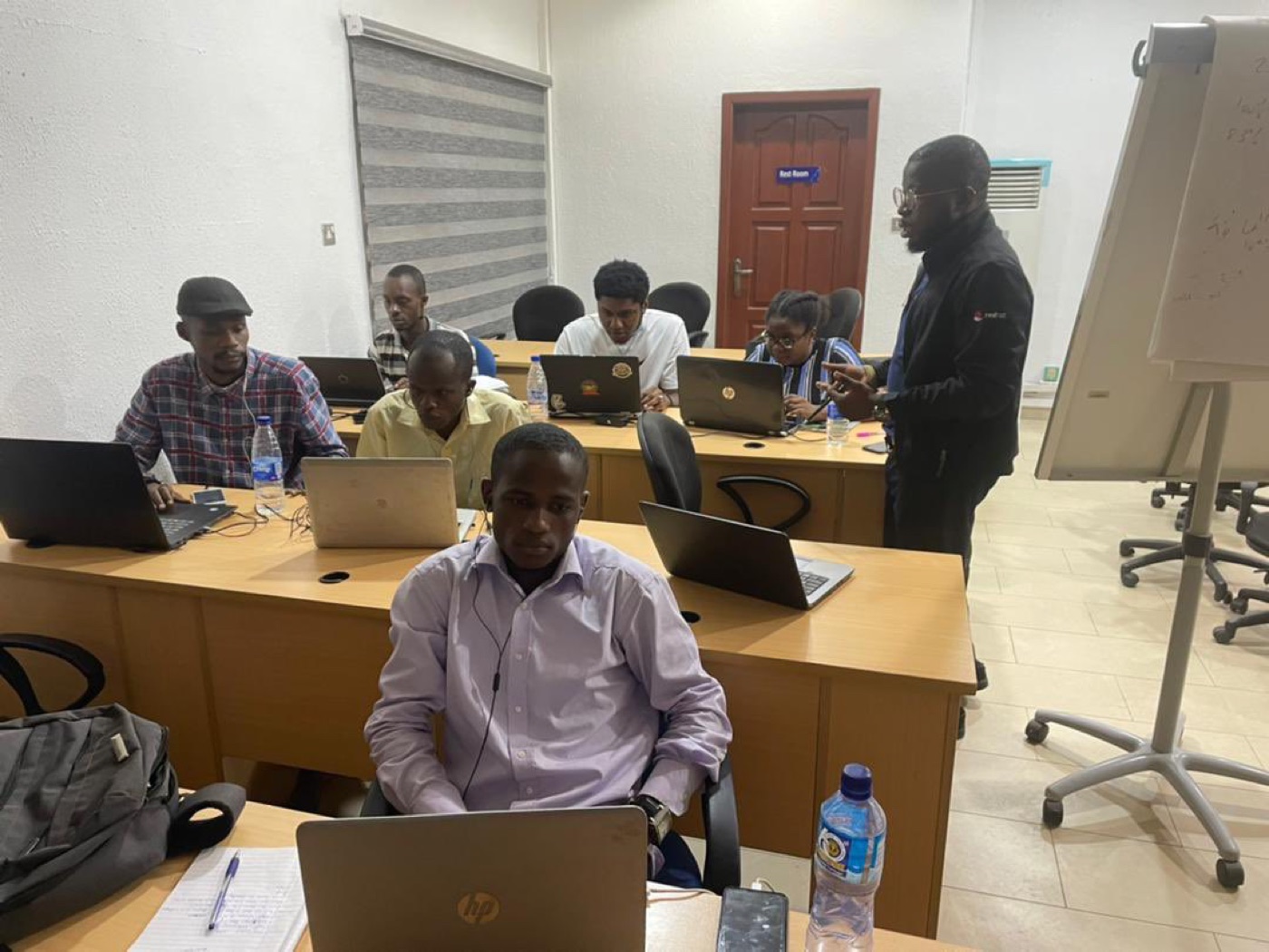 Core Dev Hub students learning with laptops